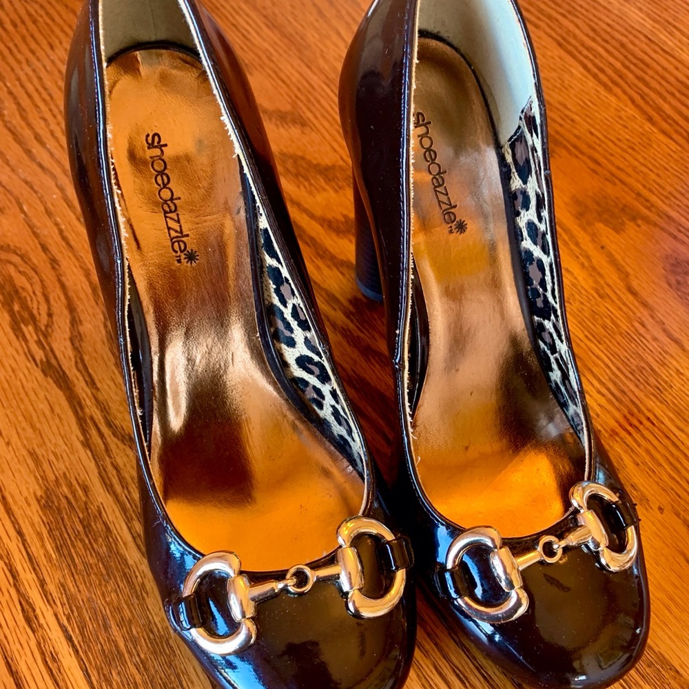 Shoe Dazzle Brown Women's patent leather Heels with gold chain accent.